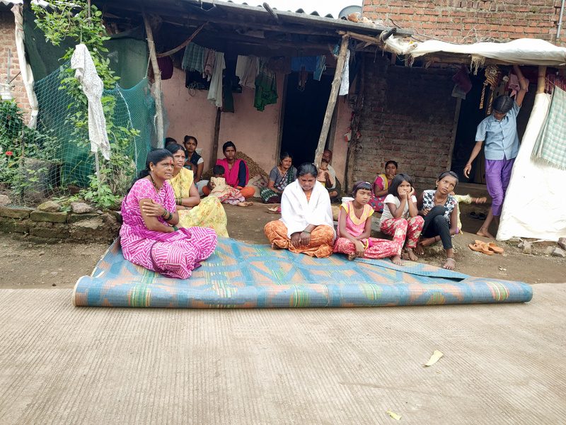 The Wellness Wave team meeting with women in a village community